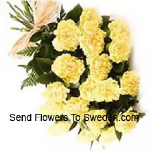 Bouquet de 19 oeillets jaunes avec des garnitures de saison