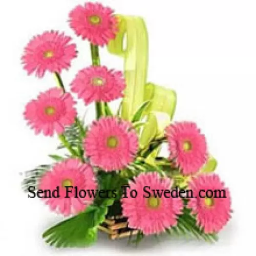 Basket Of 9 Pink Colored Gerberas With Fillers
